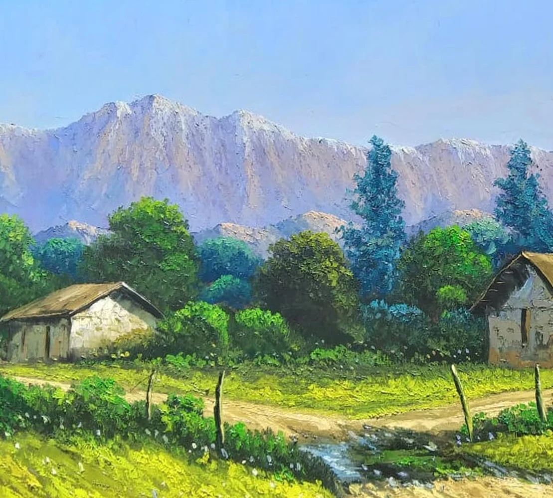 Montañas y casas entre árboles verdes de La casa del río
